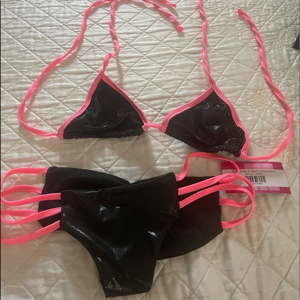 Brand new never worn 2 piece Bikini. Size Large but fits like a small/medium